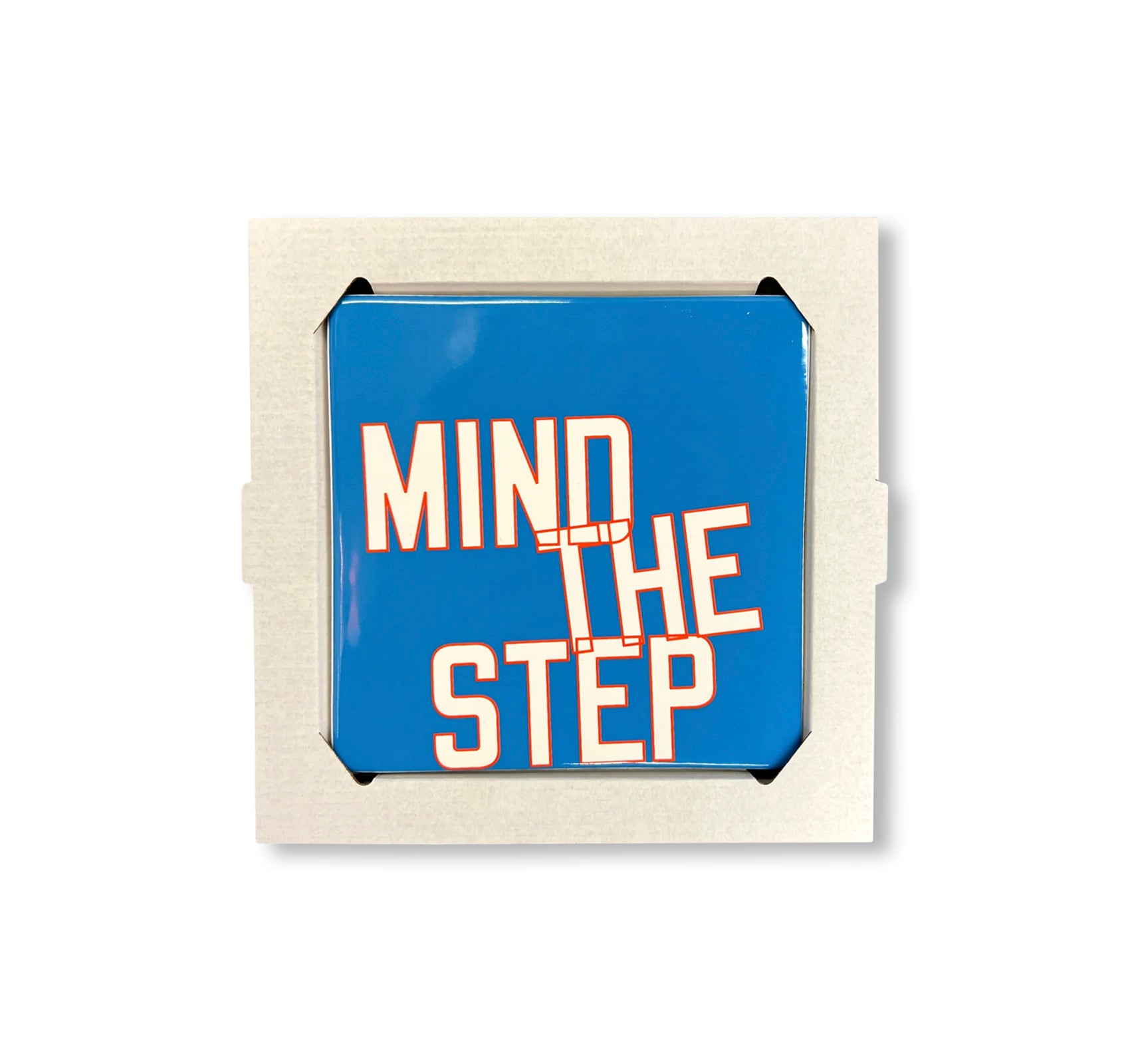 MIND THE STEP - GLAZED CERAMIC TILE by Lawrence Weiner