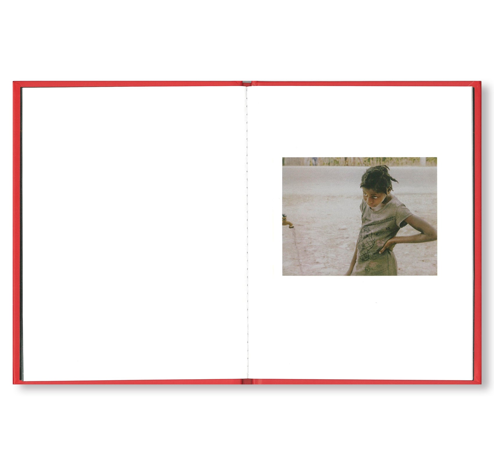 ONE PICTURE BOOK #84: POLAROIDS FROM HAITI by Jim Goldberg