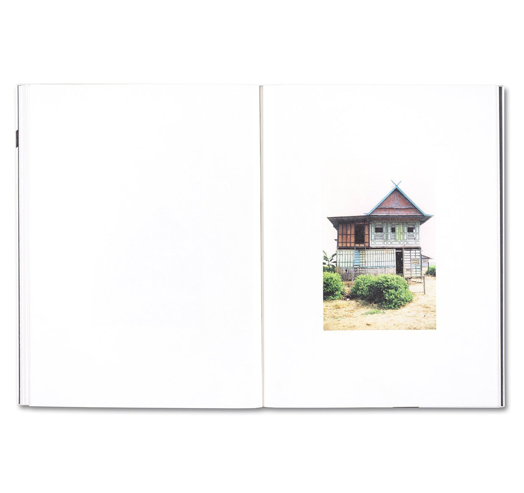 BUGIS HOUSES, CELEBES by Ursula Schulz-Dornburg